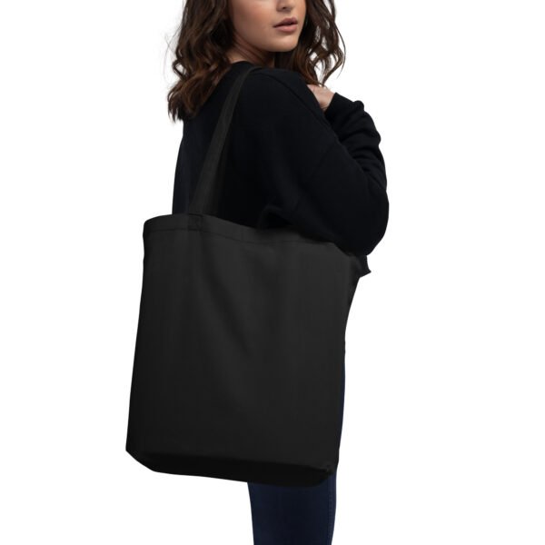Ecobolsa negra vista trasera Mujer con ecobolsa color negro, vista trasera